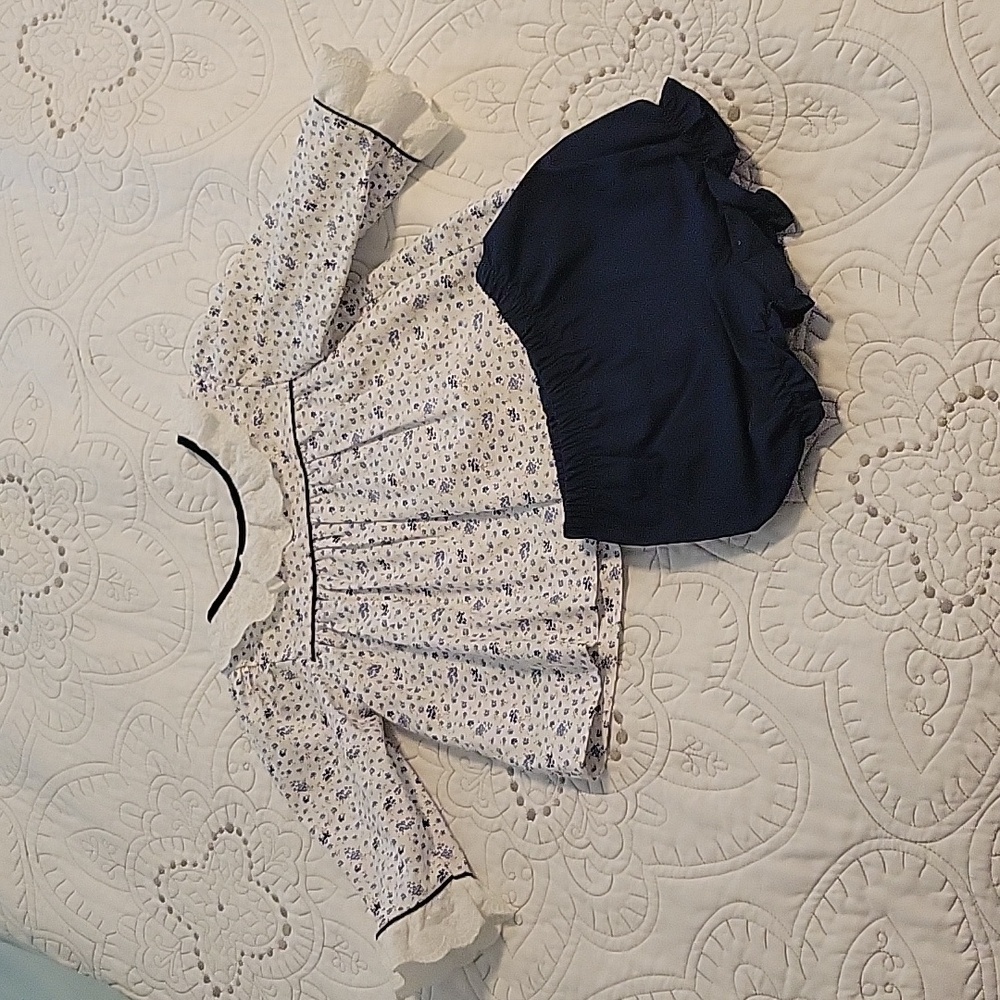 Matching set with sweet ruffles at the neck and wrist